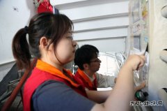 国网佳木斯供电公司：治理城市“牛皮癣” 美化环境“靓”社区